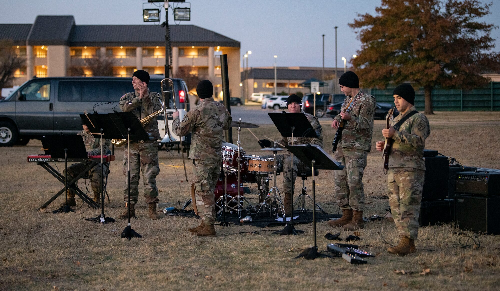 Soldiers from the Fort Sill Army Band perform a series of songs during the annual holiday tree lighting event, Dec. 3, 2020, at Altus Air Force Base, Oklahoma. The yearly tradition provided attendees the opportunity to get together to celebrate the holiday season while practicing COVID-19 mitigation measures. (U.S. Air Force photo by Airman 1st Class Amanda Lovelace)