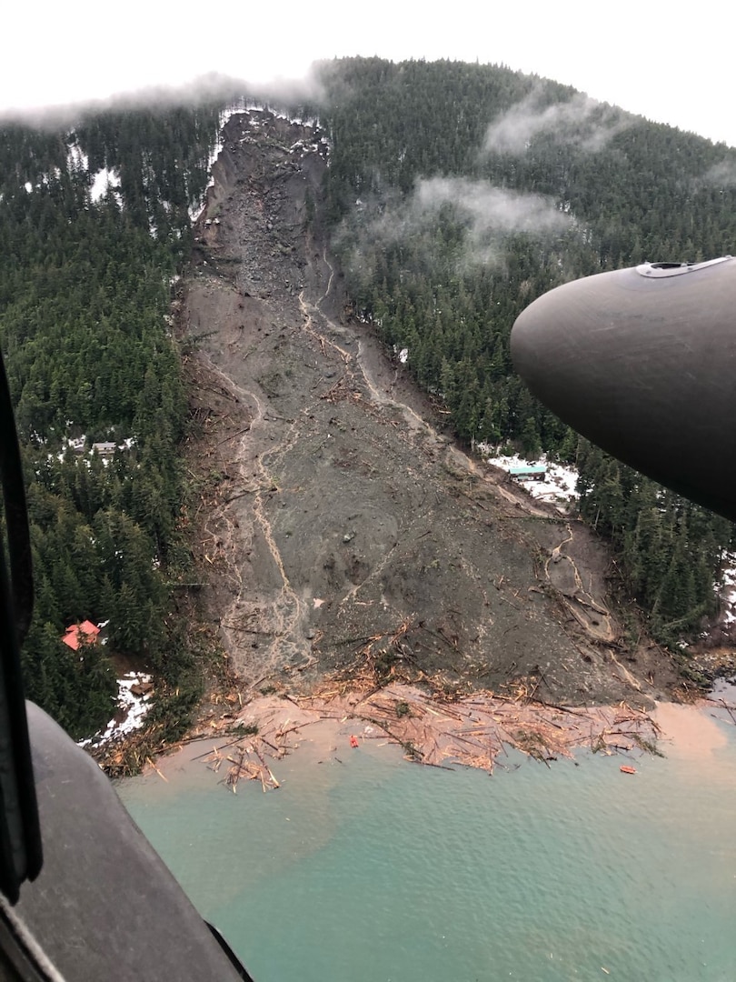 An Alaska Army National Guard UH-60 Black Hawk helicopter conducts search and rescue in Haines after a major landslide on Dec. 3, 2020.