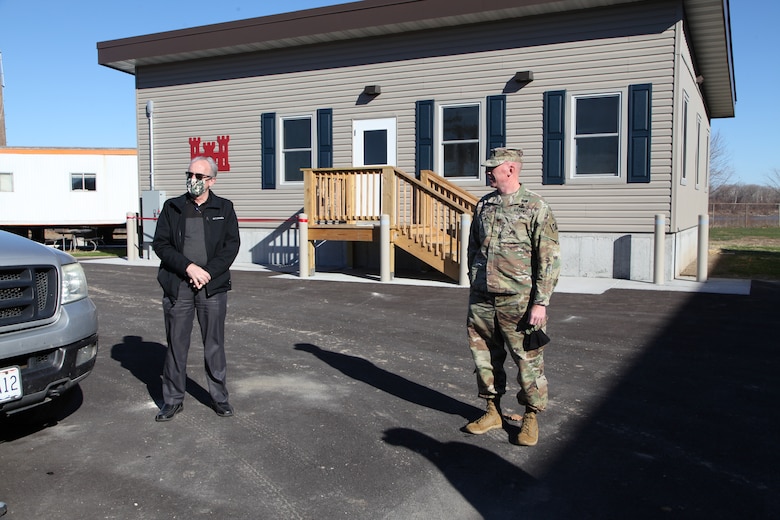 Stu Cook, chief of the district Operations Division, left, and Col. Bill Hannan, commander, Kansas City District, Northwestern Division, U.S. Army Corps of Engineers, discuss the new work facility at the Gasconade River Office December 1, 2020 prior to the ribbon cutting. Photo by Jennie Wilson, Visual Information Specialist, Kansas City District, USACE.