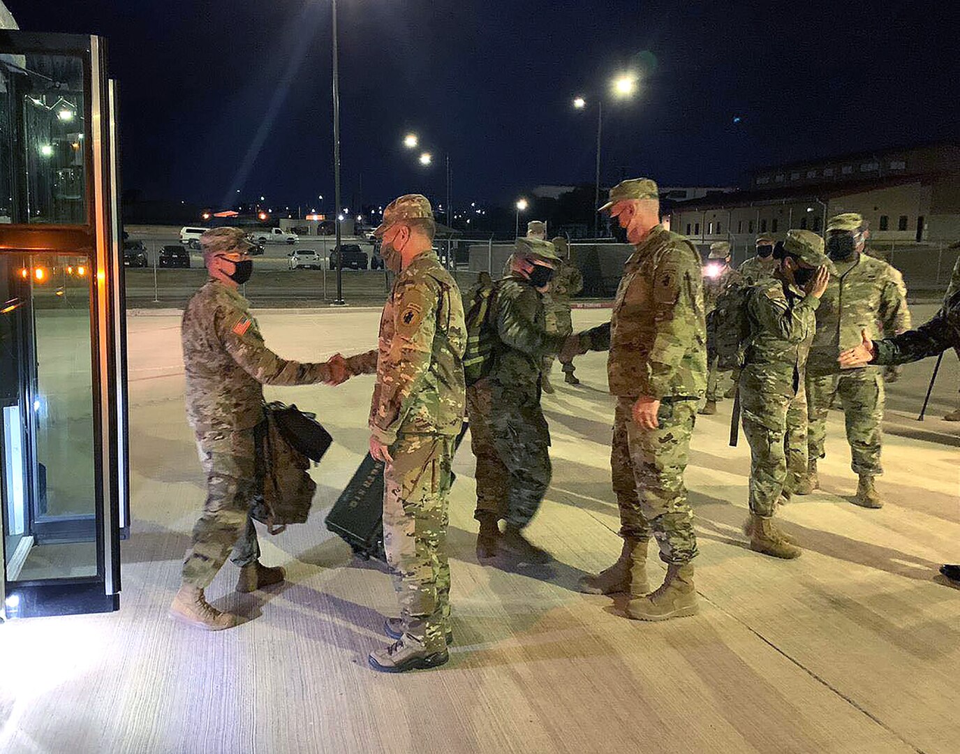 Maj. Gen. Daniel R. Walrath, U.S. Army South commanding general and Command Sgt. Maj. Trevor C. Walker, U.S. Army South command sergeant major greeted Army South personnel Dec. 3, 2020 returning from Honduras in support of the multinational disaster relief efforts following Hurricanes Eta and Iota.