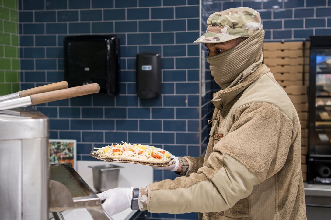 Reserve Citizen Airmen with the 514th Force Support Squadron, 514th Air Mobility Wing, serve food at Halvorsen Hall Dining Facility, Joint Base McGuire-Dix-Lakehurst, N.J., on Dec. 5, 2020. During a period of rising COVID-19 cases across the country, members of the 514 FSS continue to provide food to Airmen so that theyReserve Citizen Airmen with the 514th Force Support Squadron, 514th Air Mobility Wing, serve food at Halvorsen Hall Dining Facility, Joint Base McGuire-Dix-Lakehurst, N.J., on Dec. 5, 2020. During a period of rising COVID-19 cases across the country, members of the 514 FSS continue to provide food to Airmen so that they can accomplish the Air Force Reserve mission. can accomplish the Air Force Reserve mission.