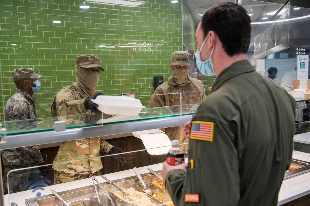 Reserve Citizen Airmen with the 514th Force Support Squadron, 514th Air Mobility Wing, serve food at Halvorsen Hall Dining Facility, Joint Base McGuire-Dix-Lakehurst, N.J., on Dec. 5, 2020. During a period of rising COVID-19 cases across the country, members of the 514 FSS continue to provide food to Airmen so that theyReserve Citizen Airmen with the 514th Force Support Squadron, 514th Air Mobility Wing, serve food at Halvorsen Hall Dining Facility, Joint Base McGuire-Dix-Lakehurst, N.J., on Dec. 5, 2020. During a period of rising COVID-19 cases across the country, members of the 514 FSS continue to provide food to Airmen so that they can accomplish the Air Force Reserve mission. can accomplish the Air Force Reserve mission.