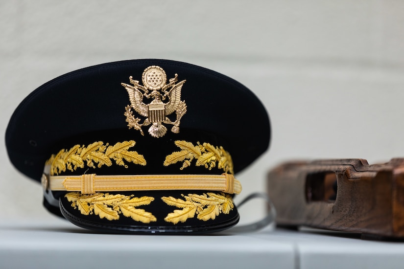 A general officer's service cap sits on a desk along with accouterments during the promotion of U.S. Army Reserve Col. Kevin Meisler. Meisler was promoted to brigadier general during a ceremony held at Joint Base San Antonio-Fort Sam Houston Dec. 5, 2020.