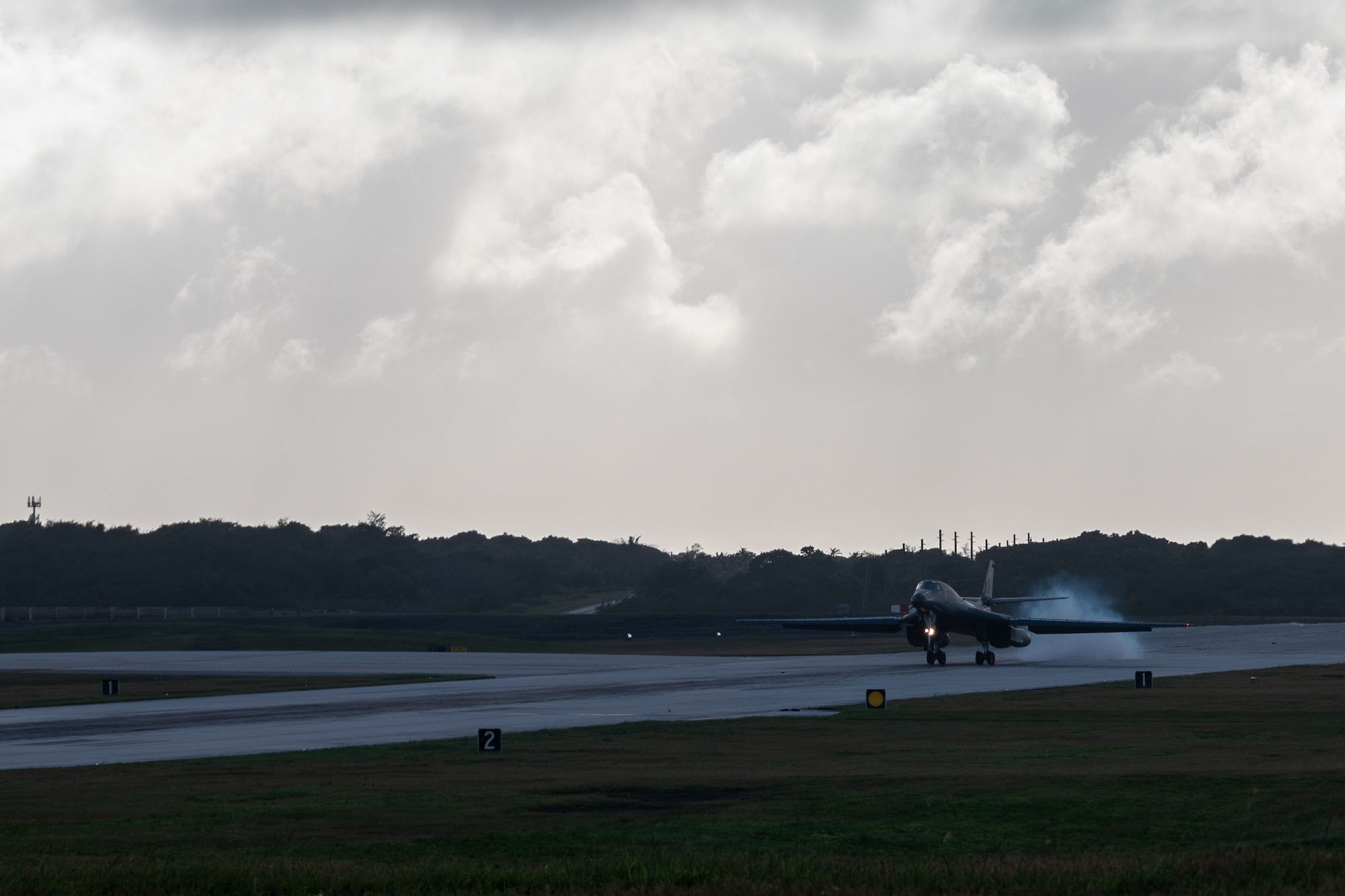 A U.S. Air Force B-1B Lancer from Ellsworth Air Force Base, S.D., lands on the flightline at Andersen Air Force Base, Guam, for a Bomber Task Force deployment, Dec. 5, 2020. BTF supports Pacific Air Forces’ strategic deterrence mission and its commitment to the security and stability of the Indo-Pacific region. (U.S. Air Force photo by Senior Airman Tristan Day)