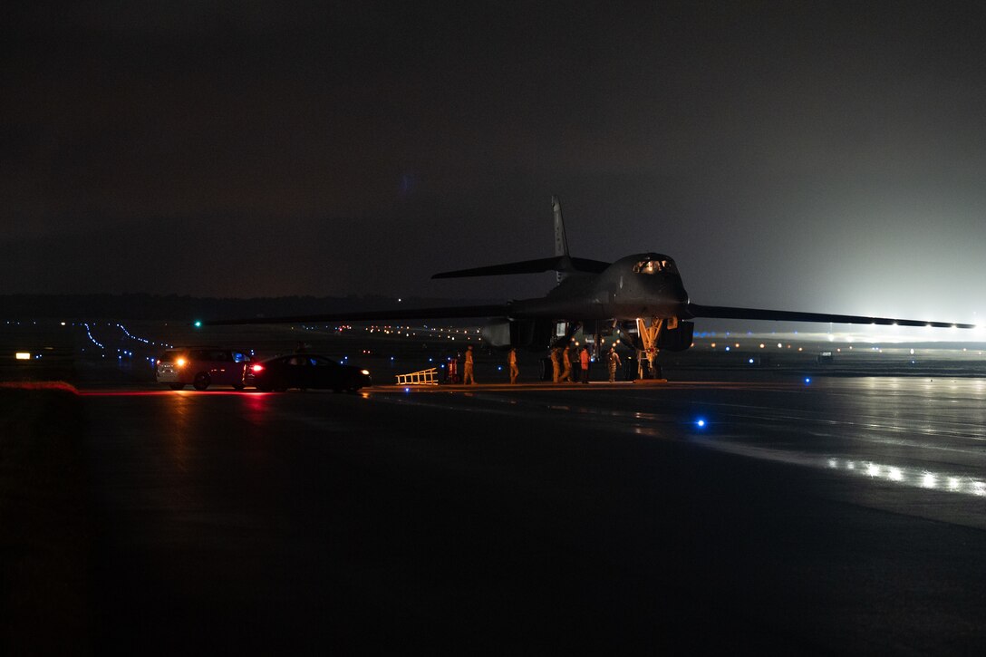 Maintainers deployed for Bomber Task Force operations conduct an inspection on a U.S. Air Force B-1B Lancer at Andersen Air Force Base, Guam, Dec. 4, 2020. The B-1B Lancer is capable of delivering massive quantities of precision and non-precision munitions against any adversary, anywhere in the world at any time. (U.S. Air Force photo by Senior Airman Tristan Day)