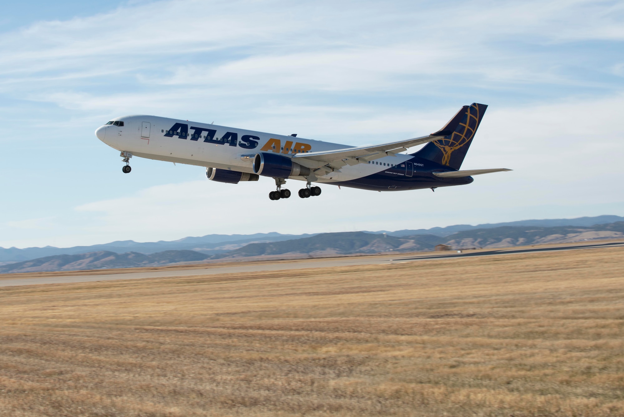 A Boeing 767 takes off for a Bomber Task Force deployment from Ellsworth Air Force Base, S.D. Dakota, Nov. 28, 2020. The deployment enables crews to remain ready to respond with lethal capability to any potential crisis or challenge across the globe. (U.S. Air Force photo by Airman Jonah Fronk)