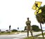 Senior Airman Pamela Restrepo, an aeromedical evacuation technician with the 927th Air Refueling Wing, MacDill Air Force Base, Florida stands near a crosswalk on Bayshore Boulevard December 5, 2020.  One month earlier, on her way home from drill, Restrepo stopped to aid a boy who was struck by a car. “Being a medic, I am on duty 24/7; it comes to use anytime, anyplace not just while I am at work,” said Restrepo.  (U.S. Air Force photo by Senior Airman Tiffany Emery)
