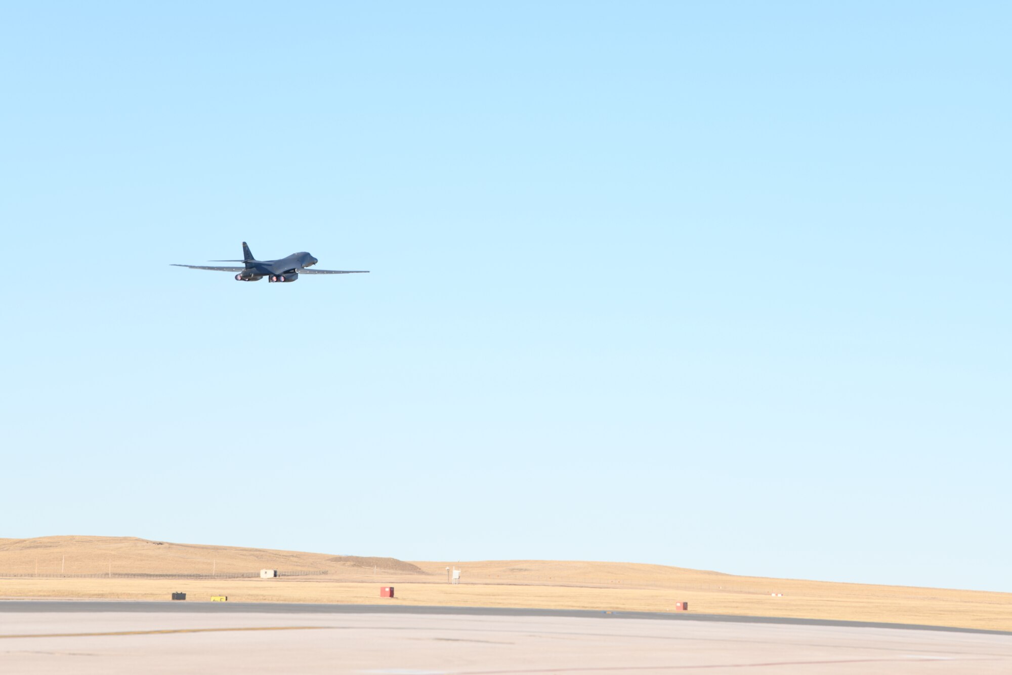 A U.S. Air Force B-1B Lancer assigned to the 28th Bomb Wing launches in support of a Bomber Task Force deployment from Ellsworth Air Force Base, S.D., Dec. 4, 2020. The dynamic force employment model empowers a small but agile footprint of maintenance personnel to generate airpower at locations across the globe. (U.S. Air Force photo by Staff Sgt. Nicolas Z. Erwin)