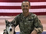 Maj. Troy Townsend, director of psychological health, NHARNG, and therapy dog, Cache, work under the Office of the State Surgeon.