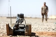 A U.S. Marine conducts an operations check on a 310 Small Unmanned Ground Vehicle on Camp Dwyer, Helmand province, Afghanistan, May 11.