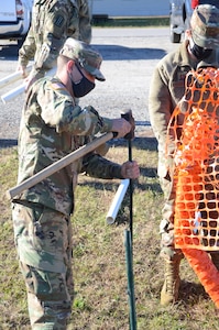 Soldiers and Airmen assigned to the Virginia National Guard’s Richmond-based 34th Chemical, Biological, Radiological, Nuclear, Explosive Enhanced Response Force Package, or CERFP, learn to use emergency response equipment during CERFP University Dec. 3, 2020, at the State Military Reservation in Virginia Beach, Virginia.