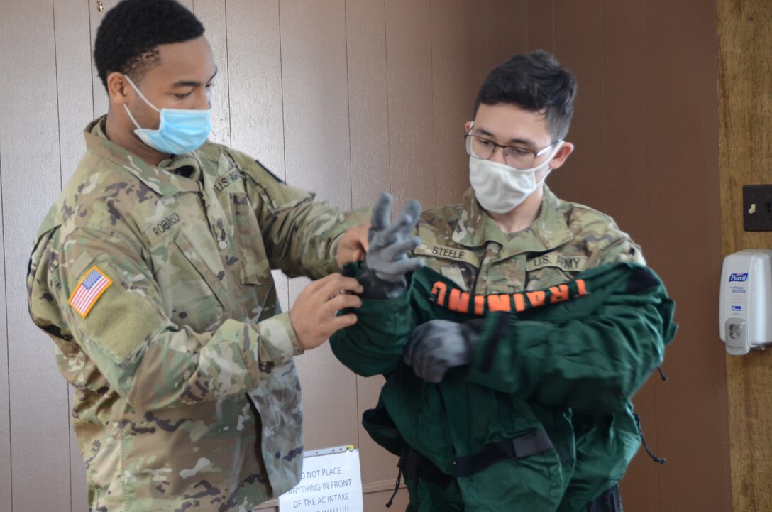 Soldiers and Airmen assigned to the Virginia National Guard’s Richmond-based 34th Chemical, Biological, Radiological, Nuclear, Explosive Enhanced Response Force Package, or CERFP, learn to use emergency response equipment during CERFP University Dec. 3, 2020, at the State Military Reservation in Virginia Beach, Virginia.