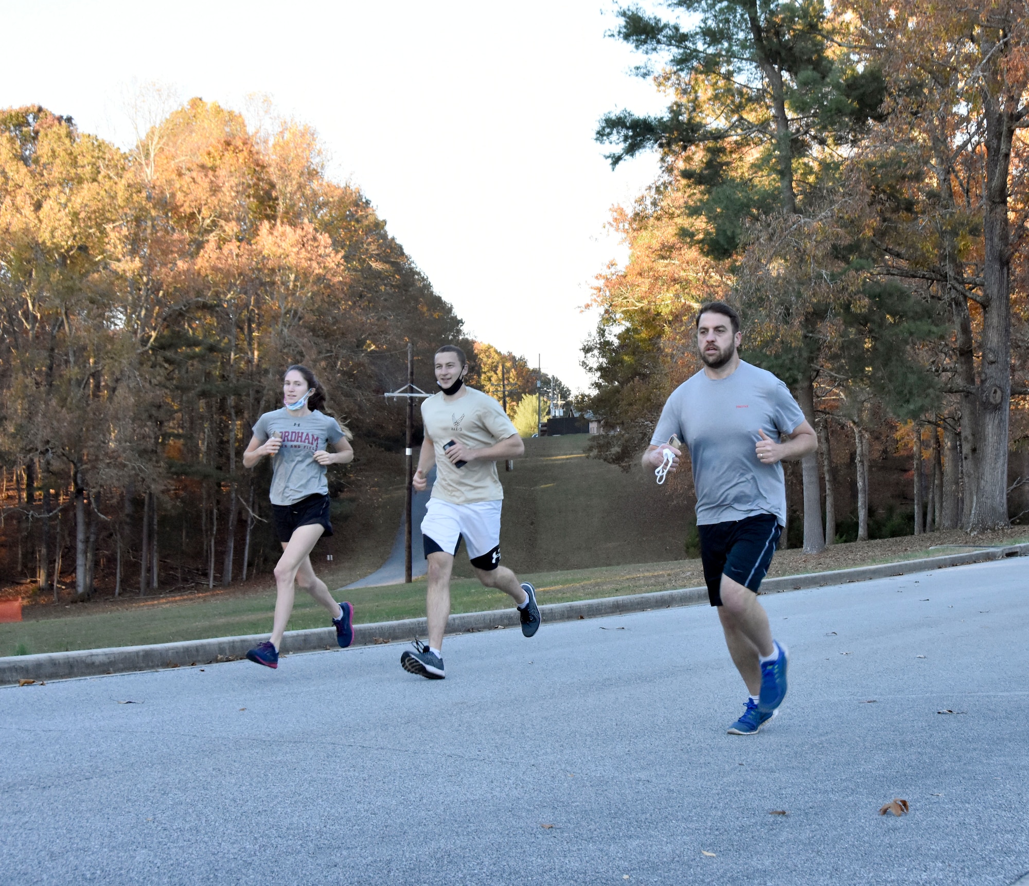 Bridget White, left, Lt. Paul McCormack, center and Ben Holton make their way through the course during the 35th annual AEDC Turkey Trot, held Nov. 13, 2020, at the Arnold Lakeside Center on Arnold Air Force Base, Tenn. (U.S. Air Force photo by Bradley Hicks)