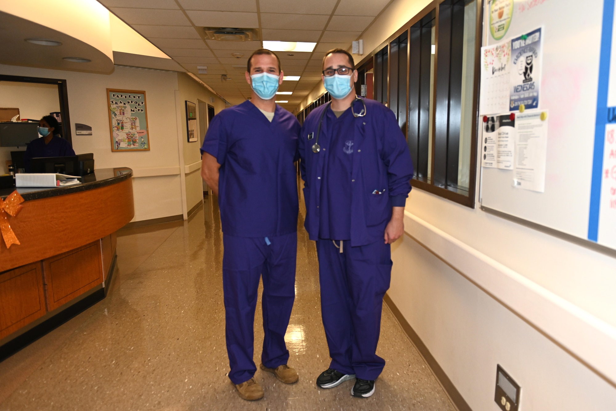 U.S. Air Force Col. Zachery Jiron, left, 60th Air Mobility Wing vice commander, recognizes 1st Lt. Zachariah Bingham, 60th Inpatient Therapeutic Squadron clinical nurse, as a star performer during Leadership Rounds Dec. 4, 2020, at Travis Air Force Base, California. The Leadership Rounds program provides 60th AMW leadership an opportunity to interact with Airmen and receive a detailed view of each mission performed at Travis AFB. (U.S. Air Force photo by Senior Airman Cameron Otte)