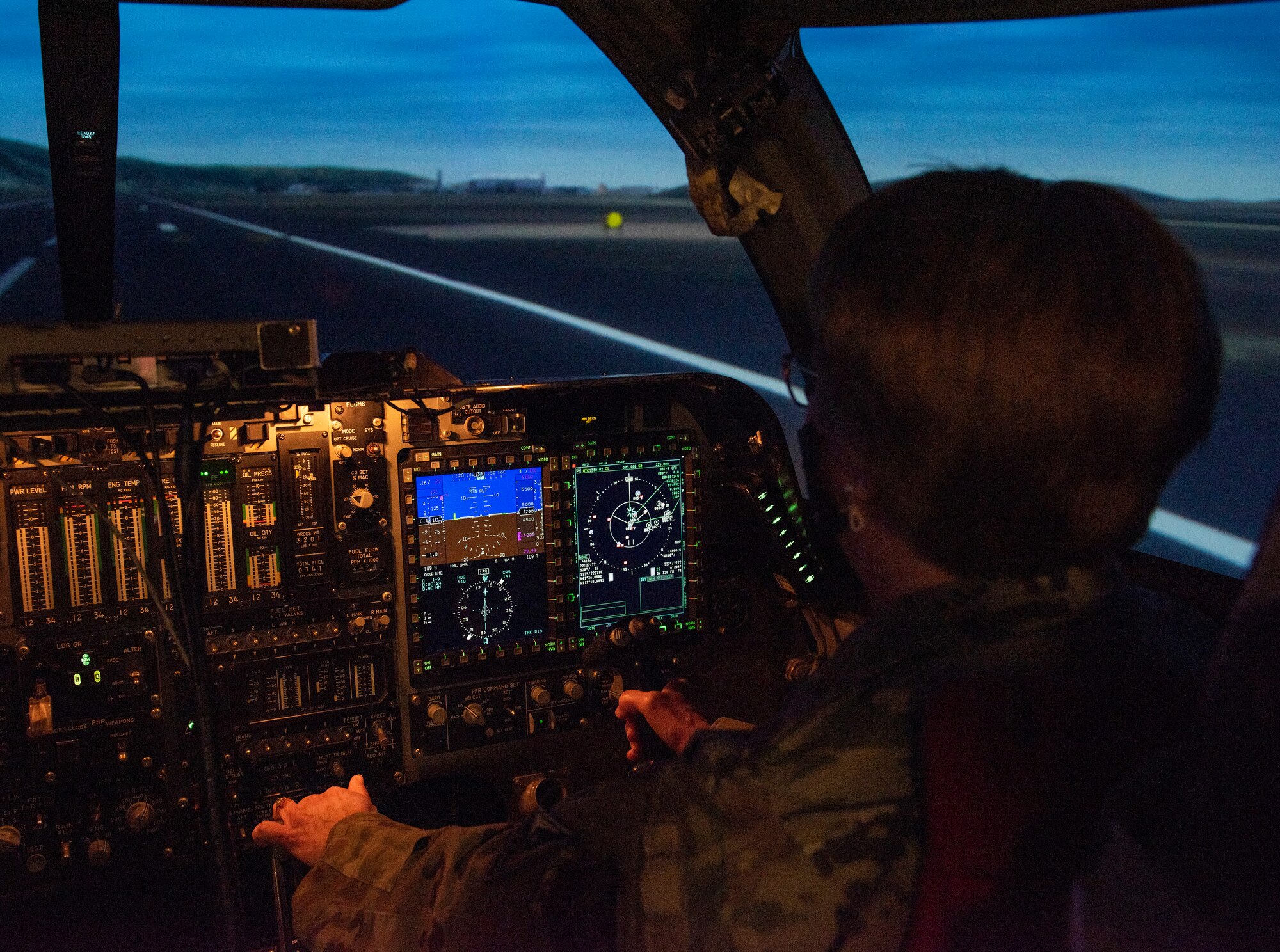 Lt. Gen. Dorothy Hogg, Air Force Surgeon General, prepares to takeoff in a B-1B bomber simulator in the 28th Bomb Squadron at Dyess Air Force Base, Texas, Dec. 3, 2020.