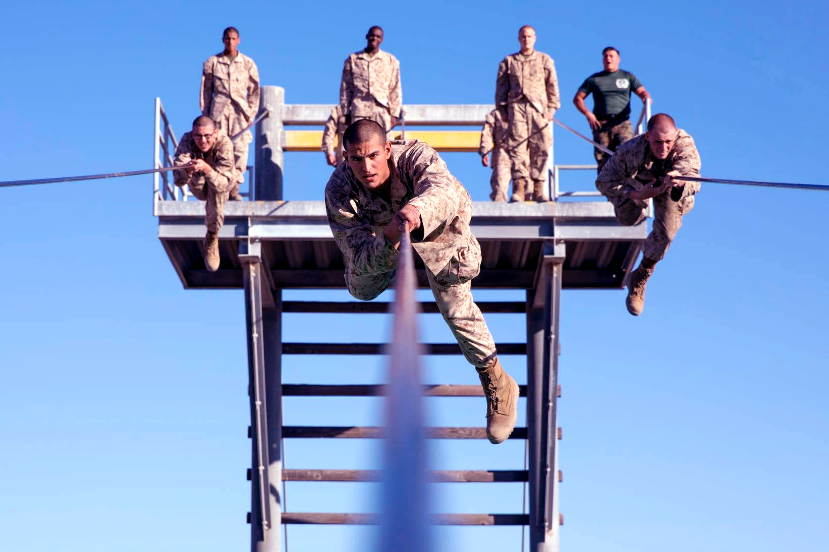 Rct. Eliseo Z. Sandoval with Bravo Company, 1st Recruit Training Battalion, overcomes an obstacle during the Confidence Course at Marine Corps Recruit Depot, San Diego, Dec. 2, 2020.