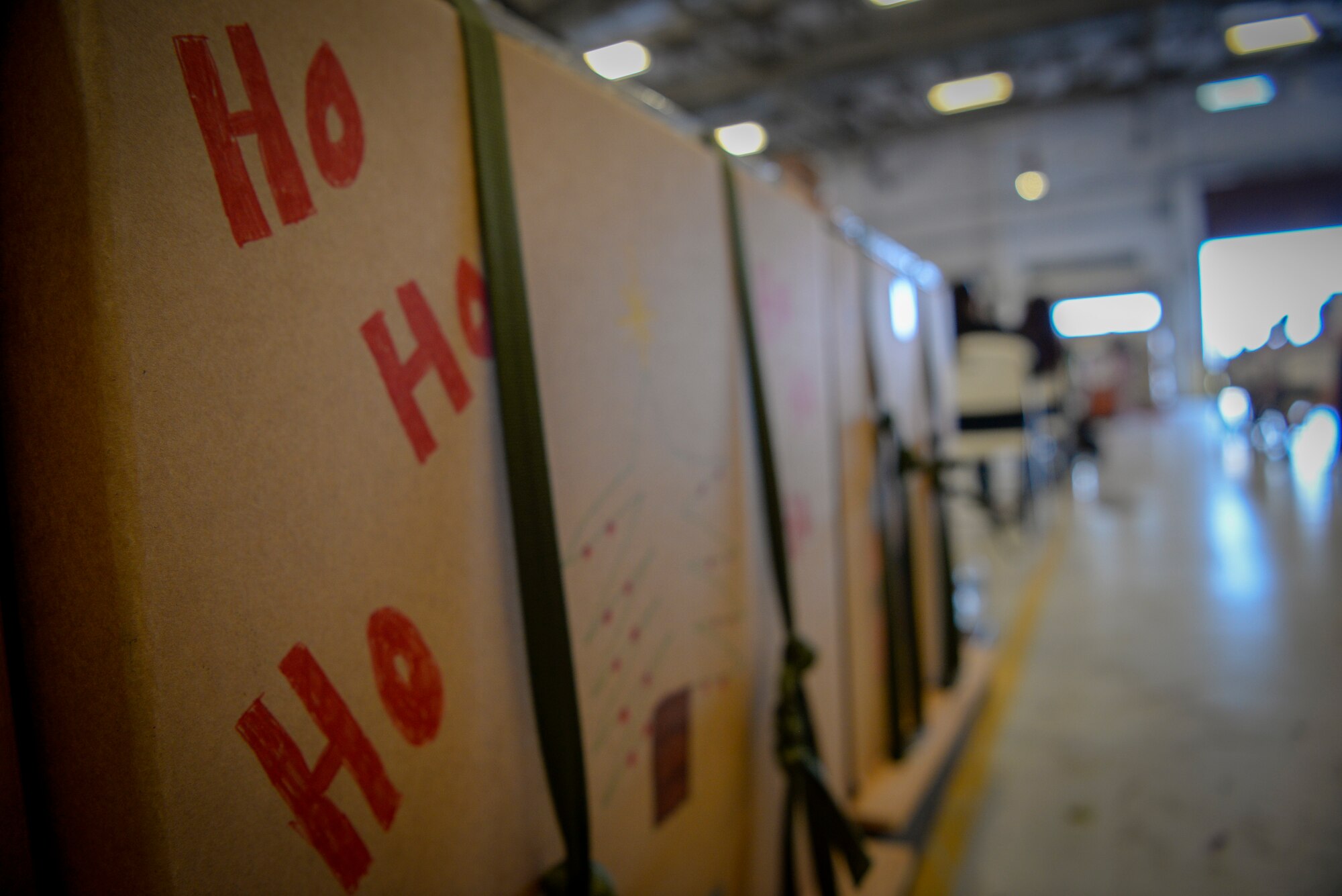 Bundles housed in the 734th Air Mobility Squadron warehouse await to be loaded onto a C-130J Hercules during the Operation Christmas Drop “Push” Ceremony at Andersen Air Force Base, Guam, Dec. 7, 2020.