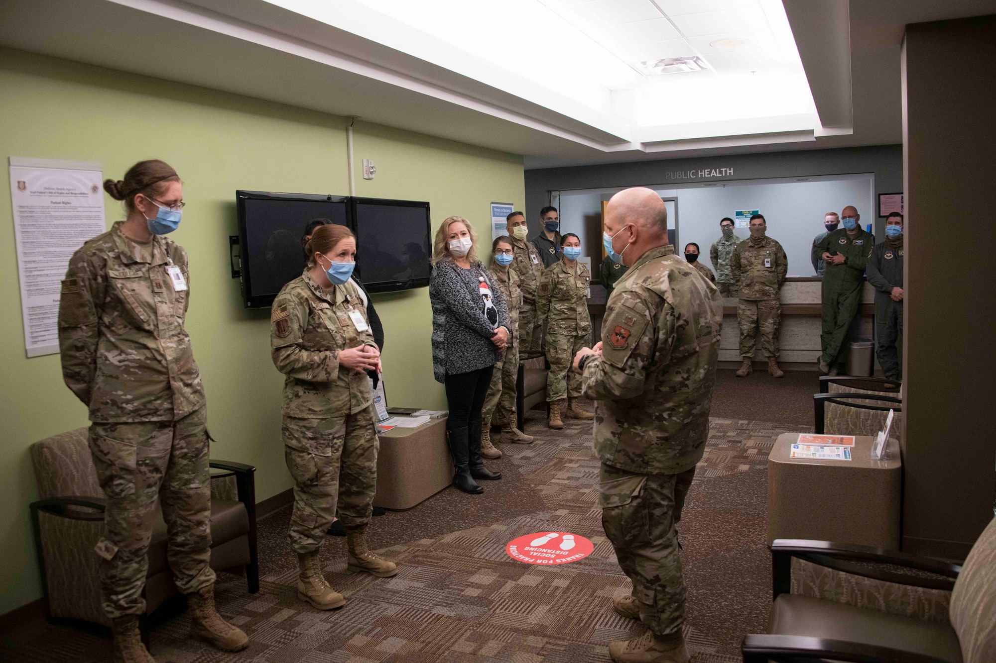 group of military members standing around