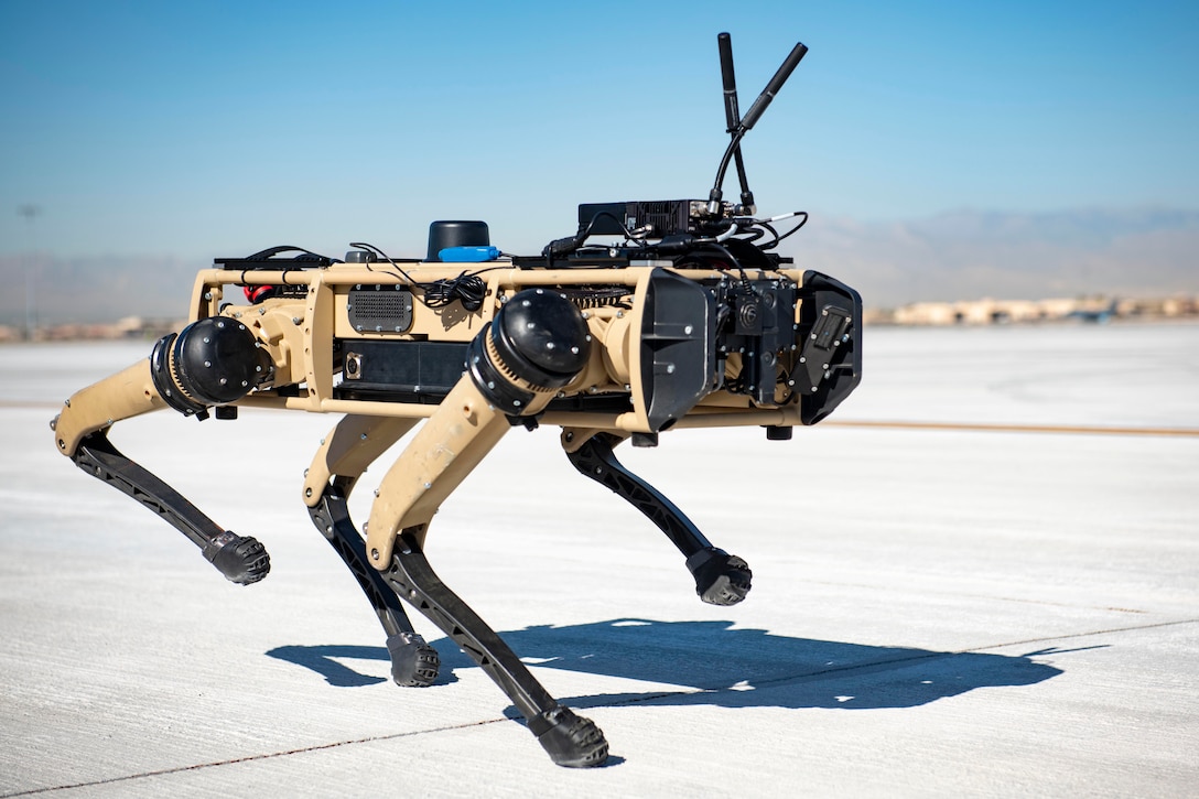 A robot walks in the desert.