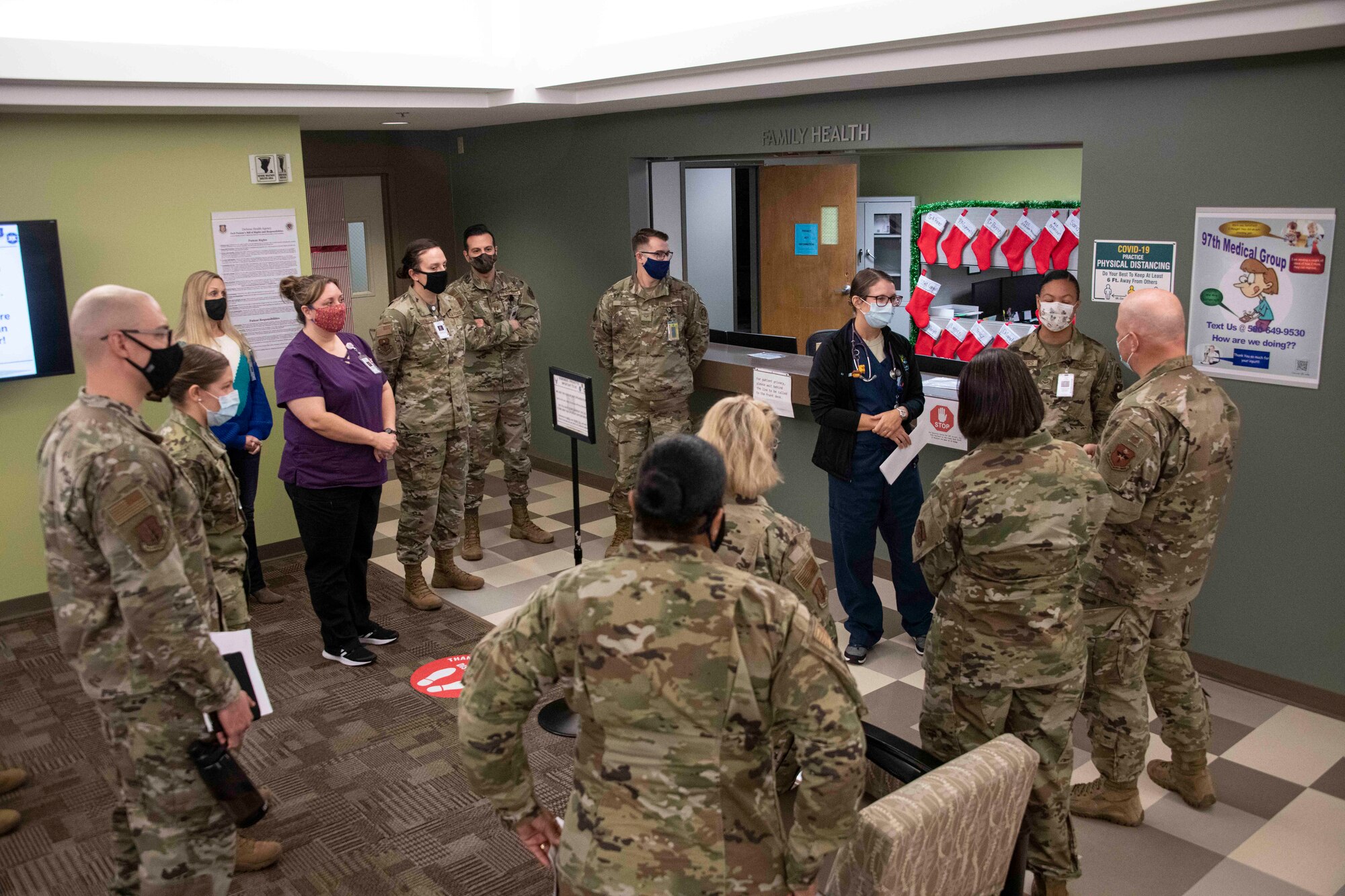 group of military people standing in a circle