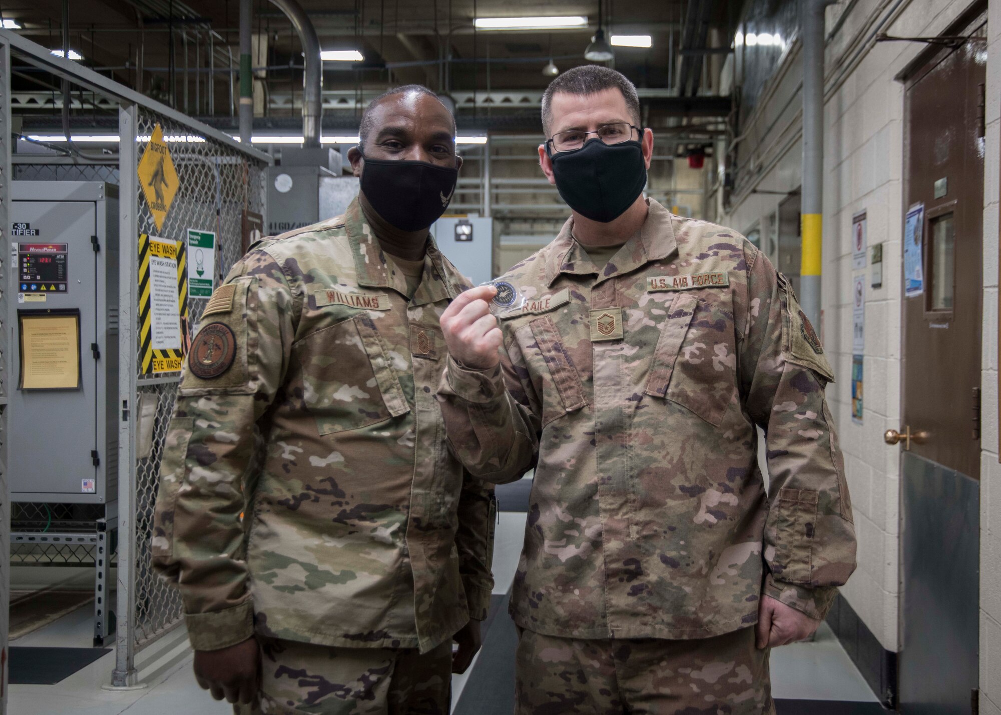 ANG command chief coins an Airman