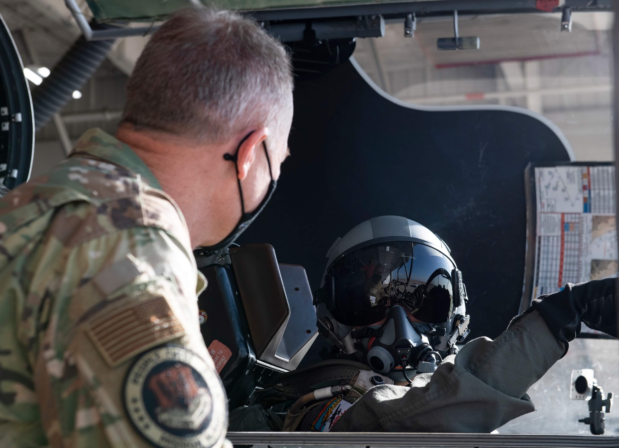 U.S. Air Force Gen. Mark Kelly, commander of Air Combat Command speaks to a U-2 pilot after conducting a training sortie, Dec. 3, 2020, at Beale Air Force Base