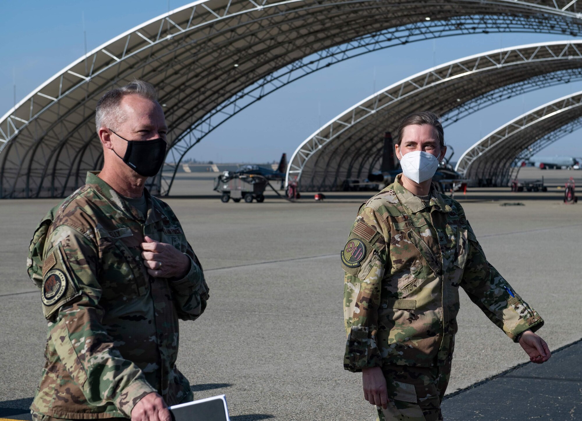 U.S. Air Force Gen. Mark Kelly, left, commander of Air Combat Command engages with Col. Heather Fox, 9th Reconnaissance Wing commander, as he begins a mission, Airmen, and capabilities immersion at Beale Air Force Base.