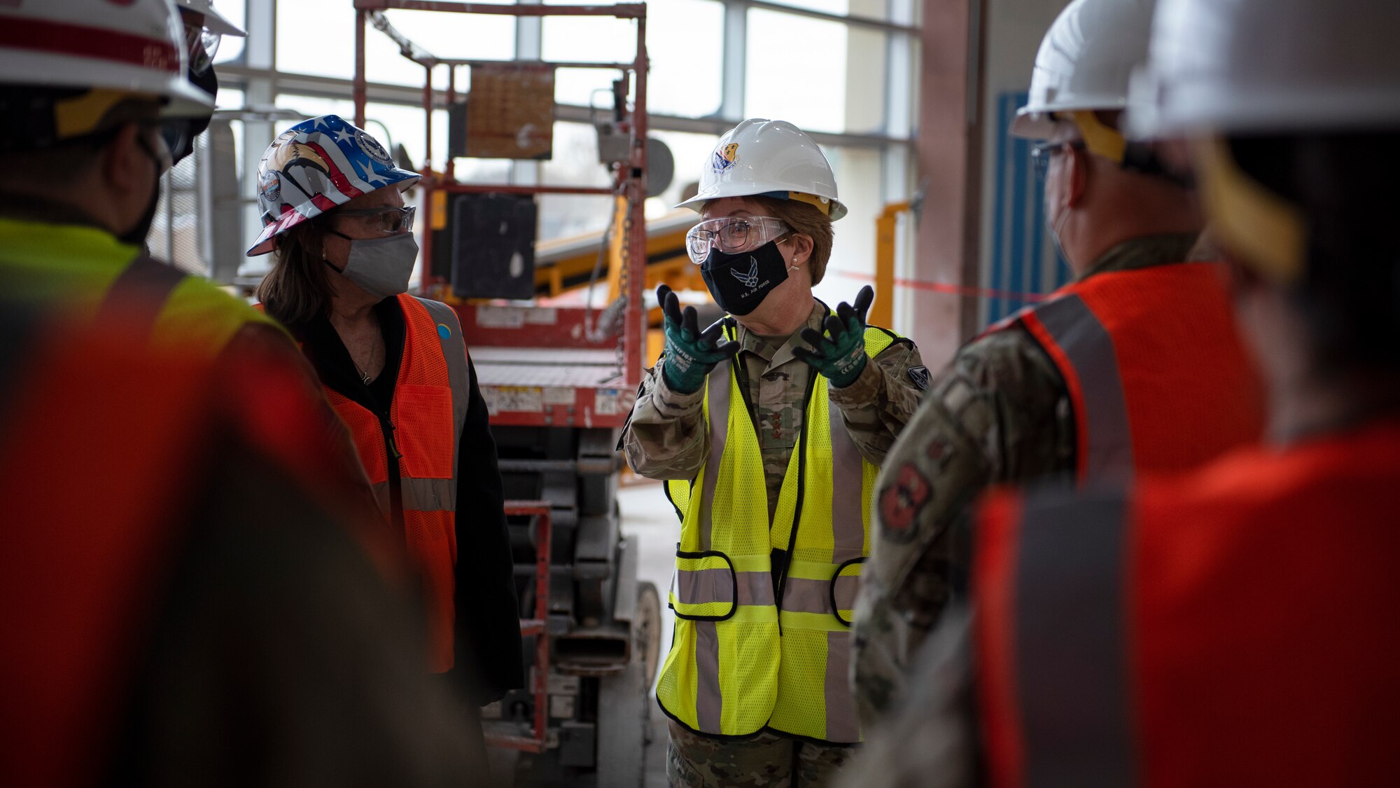 Lt. General Dorothy Hogg, Air Force Surgeon General, talks to fellow tour members during a tour of the, still being constructed, new medical facility at Sheppard Air Force Base, Texas, Dec. 2, 2020. The new treatment facility will help the MDG stay on the cutting edge of medical care and allow Sheppard AFB  beneficiaries to continue to receive the best medical care and be ready for anything in the years to come. (U.S. Air Force photo by Senior Airman Pedro Tenorio)