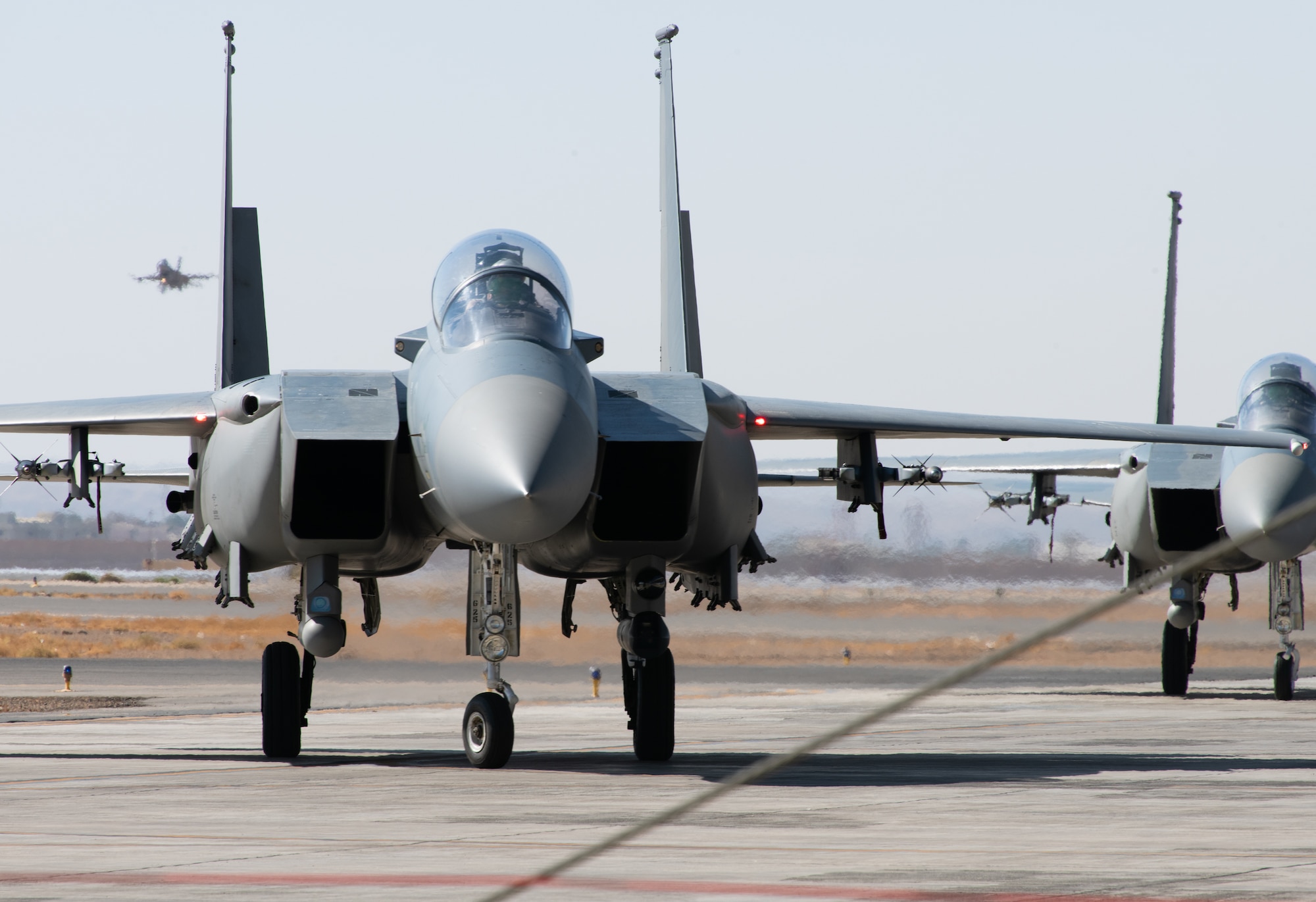 Royal Saudi Air Force F-15 Eagles taxi after a sortie Dec. 1, 2020, at King Faisal Air Base, Kingdom of Saudi Arabia.