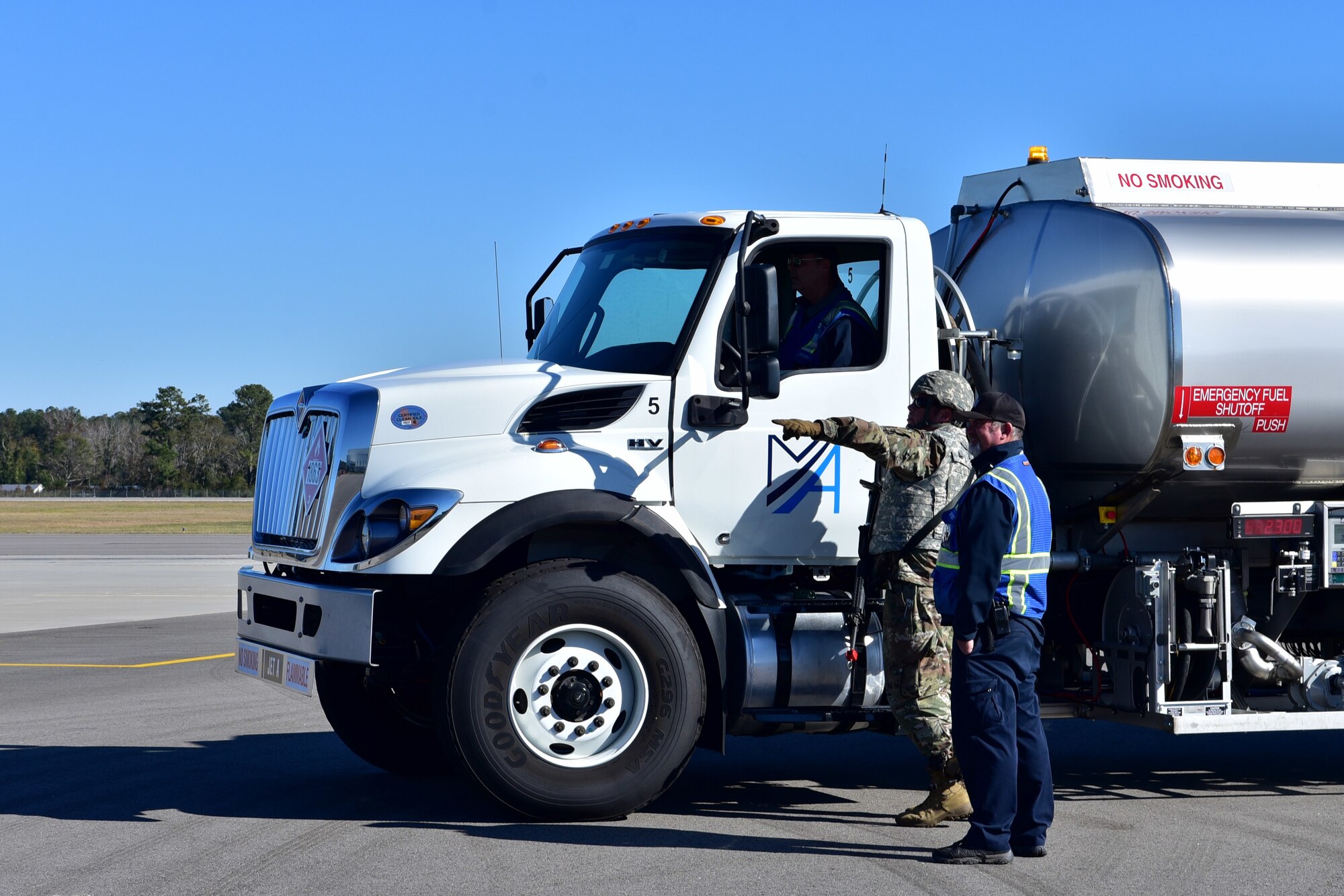 Master Sgt. Michael Cole, 336th Fighter Squadron tactical aircraft maintenance section flight chief, directs personnel from Modern Aviation during Exercise Razor Talon 21-1 at Wilmington International Airport, Wilmington, North Carolina.