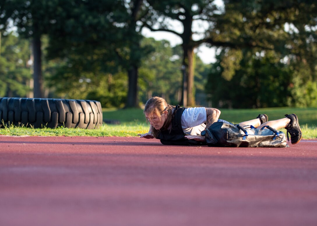 Master Sergeant Jacque Risley, 4th Civil Engineer Squadron Explosive Ordnance Disposal Noncommissioned Officer in charge of Operations, prepares for the Gruster, as part of the career field’s new Tier 2 Physical Fitness Test at Seymour Johnson Air Force Base, North Carolina, August 26, 2020.