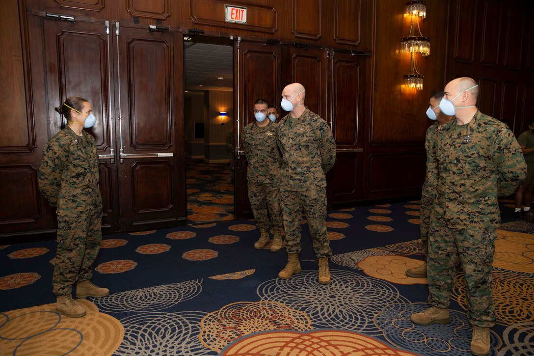 The 19th Sergeant Major of the Marine Corps, Sgt. Maj. Troy E. Black tours the Restriction of Movement (ROM) facilities in Atlanta, G.a., receiving young adults on their way to Marine Corps Recruit Depot Parris Island for basic training, Nov. 30, 2020. Black met with the Marines of Task Force Commitment who carry out the necessary duties to ensure the safe in-processing of Marine Corps recruits. The ROM facilities put in place to process new recruits prior to arriving at the recruit depots, is one of the many protection measures the Marine Corps has put in place to prevent the spread of COVID19. (U.S. Marine Corps photo by Sgt. Victoria Ross)