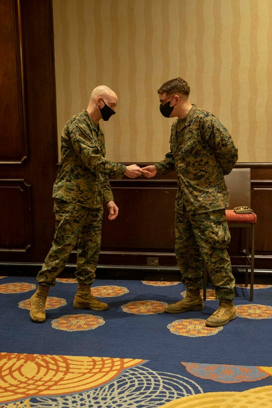 The 19th Sergeant Major of the Marine Corps, Sgt. Maj. Troy E. Black tours the Restriction of Movement (ROM) facilities in Atlanta, G.a., receiving young adults on their way to Marine Corps Recruit Depot Parris Island for basic training, Nov. 30, 2020. Black met with the Marines of Task Force Commitment who carry out the necessary duties to ensure the safe in-processing of Marine Corps recruits. The ROM facilities put in place to process new recruits prior to arriving at the recruit depots, is one of the many protection measures the Marine Corps has put in place to prevent the spread of COVID19. (U.S. Marine Corps photo by Sgt. Victoria Ross)