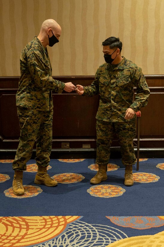 The 19th Sergeant Major of the Marine Corps, Sgt. Maj. Troy E. Black tours the Restriction of Movement (ROM) facilities in Atlanta, G.a., receiving young adults on their way to Marine Corps Recruit Depot Parris Island for basic training, Nov. 30, 2020. Black met with the Marines of Task Force Commitment who carry out the necessary duties to ensure the safe in-processing of Marine Corps recruits. The ROM facilities put in place to process new recruits prior to arriving at the recruit depots, is one of the many protection measures the Marine Corps has put in place to prevent the spread of COVID19. (U.S. Marine Corps photo by Sgt. Victoria Ross)