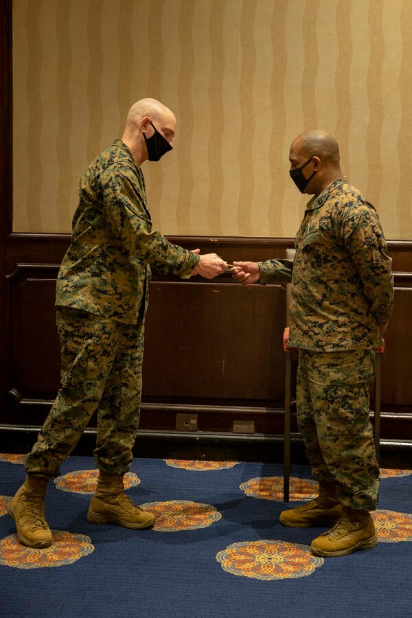 The 19th Sergeant Major of the Marine Corps, Sgt. Maj. Troy E. Black tours the Restriction of Movement (ROM) facilities in Atlanta, G.a., receiving young adults on their way to Marine Corps Recruit Depot Parris Island for basic training, Nov. 30, 2020. Black met with the Marines of Task Force Commitment who carry out the necessary duties to ensure the safe in-processing of Marine Corps recruits. The ROM facilities put in place to process new recruits prior to arriving at the recruit depots, is one of the many protection measures the Marine Corps has put in place to prevent the spread of COVID19. (U.S. Marine Corps photo by Sgt. Victoria Ross)