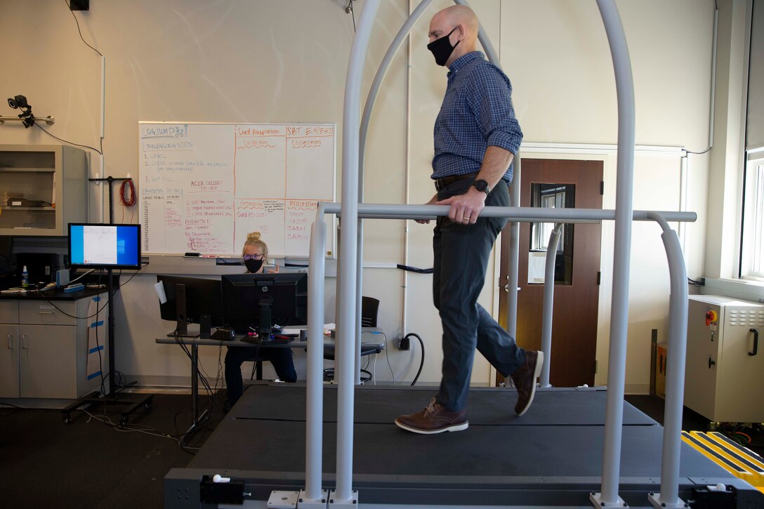 The 19th Sergeant Major of the Marine Corps, Sgt. Maj. Troy E. Black, tests the dual treadmill at the Auburn University Athletic Complex, Dec. 1, 2020. Black met with athletic department staff to discuss the Marine Corps’ human performance goals and how some of the research, techniques and procedures used at the Auburn University Kinesiology labs can benefit the Marine Corps fitness model. Human performance is key to remaining a capable force that is ready to fight in any clime and place. (U.S. Marine Corps photo by Sgt. Victoria Ross)