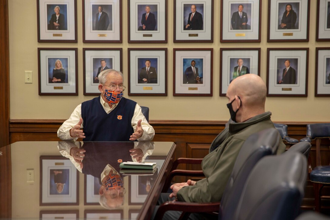 The 19th Sergeant Major of the Marine Corps, Sgt. Maj. Troy E. Black, greets retired Army Lt. Gen. Ron Burgess, the Chief Operating Officer at Auburn University Dec. 1, 2020. Black met with Auburn University athletic department staff to discuss the Marine Corps’ human performance goals and how some of the research, techniques and procedures used at the Auburn University Kinesiology labs can benefit the Marine Corps fitness model. Human performance is key to remaining a capable force that is ready to fight in any clime and place. (U.S. Marine Corps photo by Sgt. Victoria Ross)