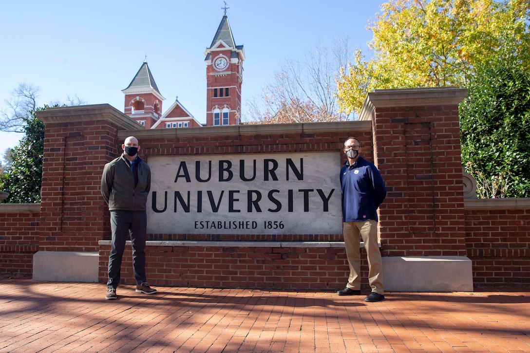 The 19th Sergeant Major of the Marine Corps, Sgt. Maj. Troy E. Black, greets Coach Scott Richardson at Auburn University Dec. 1, 2020. Black met with Auburn University athletic department staff to discuss the Marine Corps’ human performance goals and how some of the research, techniques and procedures used at the Auburn University Kinesiology labs can benefit the Marine Corps fitness model. Human performance is key to remaining a capable force that is ready to fight in any clime and place. (U.S. Marine Corps photo by Sgt. Victoria Ross)