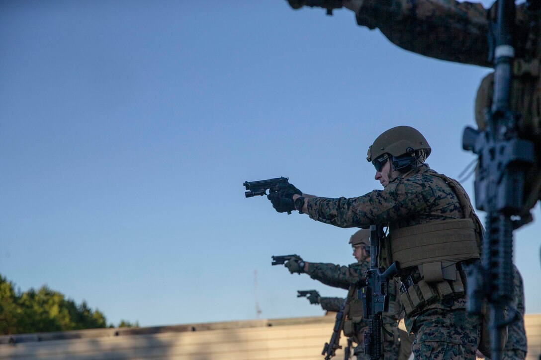 The 19th Sergeant Major of the Marine Corps, Sgt. Maj. Troy E. Black visits Marines with Marine Corps Security Force Training Company, Chesapeake, V.a., Dec. 2, 2020. The visit included a Close Quarters Battle shooting package and discussions with Non-Commissioned and Staff Non-Commissioned Officers. The mission of Marine Corps Security Force Training Company is to train and qualify Marines in the Military Occupational Specialties of 8152 (Basic Security Guard) and 8154 (Close Quarters Battle Team Member) for service within Marine Corps Security Force Battalions, Fleet Anti-Terrorism Security Team (FAST) Companies, and Marine Barracks 8th & I, Washington, DC.(U.S. Marine Corps photo by Sgt. Victoria Ross)