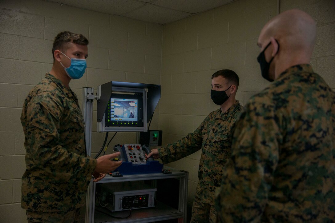 The 19th Sergeant Major of the Marine Corps, Sgt. Maj. Troy E. Black visits Marines with Marine Corps Security Force Traning Company, Chesapeake, V.a., Dec. 3, 2020. The visit included discussions with staff and students. The mission of Marine Corps Security Force Training Company is to train and qualify Marines in the Military Occupational Specialties of 8152 (Basic Security Guard) and 8154 (Close Quarters Battle Team Member) for service within Marine Corps Security Force Battalions, Fleet Anti-Terrorism Security Team (FAST) Companies, and Marine Barracks 8th & I, Washington, DC.(U.S. Marine Corps photo by Sgt. Victoria Ross)