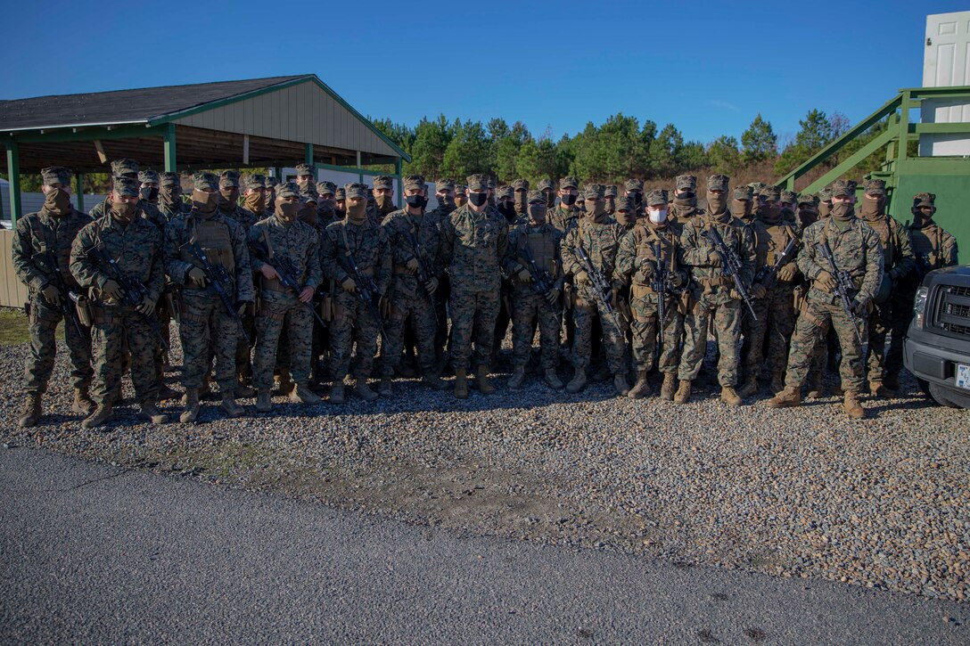 The 19th Sergeant Major of the Marine Corps, Sgt. Maj. Troy E. Black visits Marines with Marine Corps Security Force Traning Company, Chesapeake, V.a., Dec. 3, 2020. The visit included discussions with staff and students. The mission of Marine Corps Security Force Training Company is to train and qualify Marines in the Military Occupational Specialties of 8152 (Basic Security Guard) and 8154 (Close Quarters Battle Team Member) for service within Marine Corps Security Force Battalions, Fleet Anti-Terrorism Security Team (FAST) Companies, and Marine Barracks 8th & I, Washington, DC.(U.S. Marine Corps photo by Sgt. Victoria Ross)