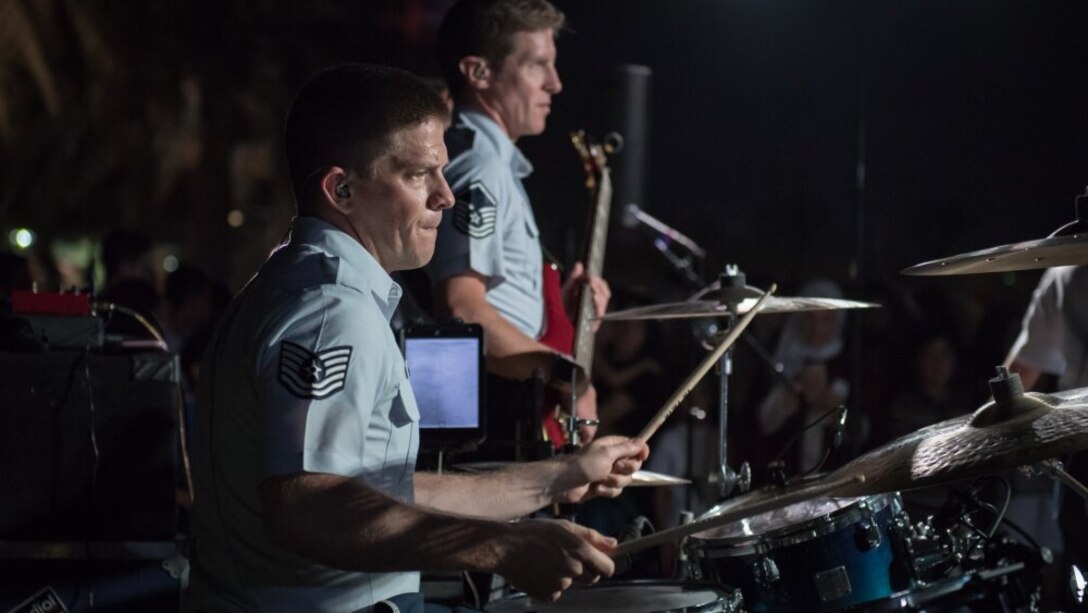 Technical Sgt. Daniel Dowling performs with Supersonic outside the Marina Mall in Salmiya, Kuwait. (U.S. Air Force photo by Technical Sgt. Daniel Martinez)