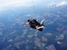 An Airmen skydives.
