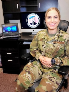 Senior Airman Nicole Ligeza is partnered with Weber-Morgan County as she teleworks from her home office contacting people after they receive a positive COVID-19 test.