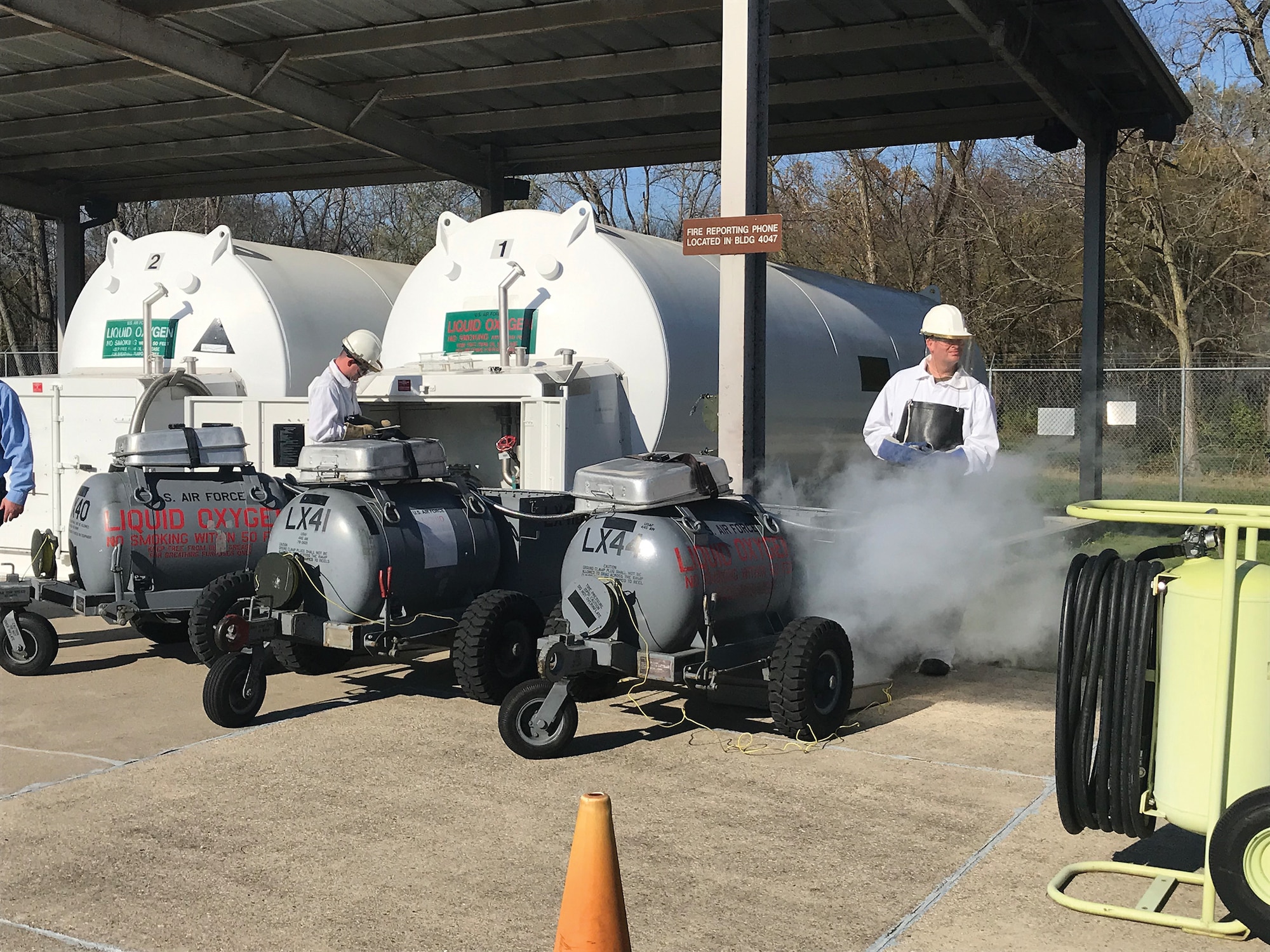 Senior Airman Jeremy Miller, fuels technician, and Tech. Sgt. Richard Blake, NCO in charge of operations, 445th Logistics Readiness Squadron fuels management flight, service liquid oxygen (LOX) carts during the Nov. 6, 2020 unit training assembly. The FMT conducts samples prior to filling the LOX carts. If the sample results in an odor that is similar to rotten eggs, then the batch of LOX is discarded.