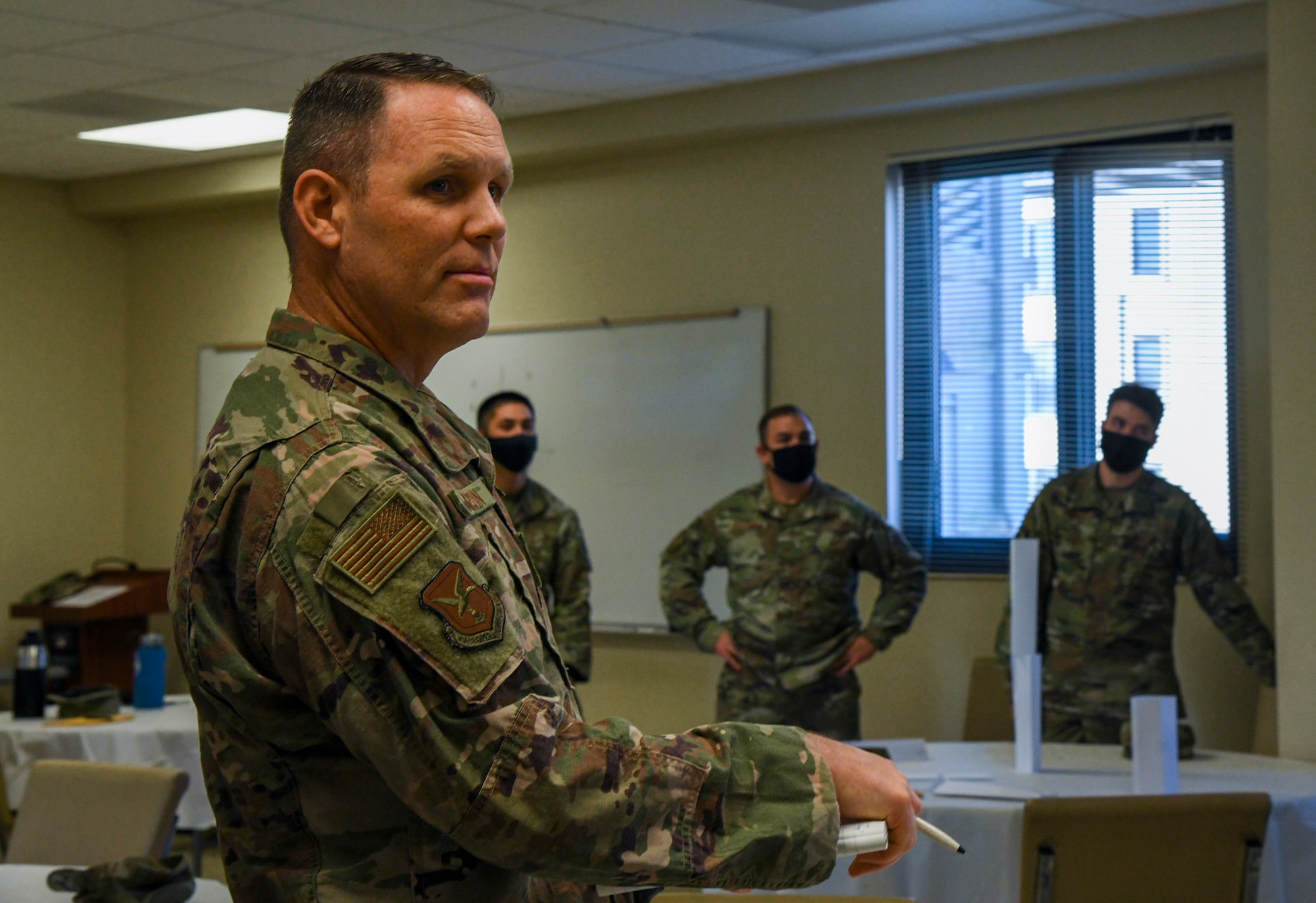 Chaplain (Capt.) Jonathan Dawson, 436th Airlift Wing chaplain, evaluates a team-building exercise during an Eagles SOAR-EDU self-awareness class at Dover Air Force Base, Delaware, Oct. 22, 2020. Eagles SOAR-EDU is a professional development platform and resource hub for all Airmen and Department of Defense civilian workers at Dover Air Force Base. (U.S. Air Force photo by Airman 1st Class Stephani Barge)