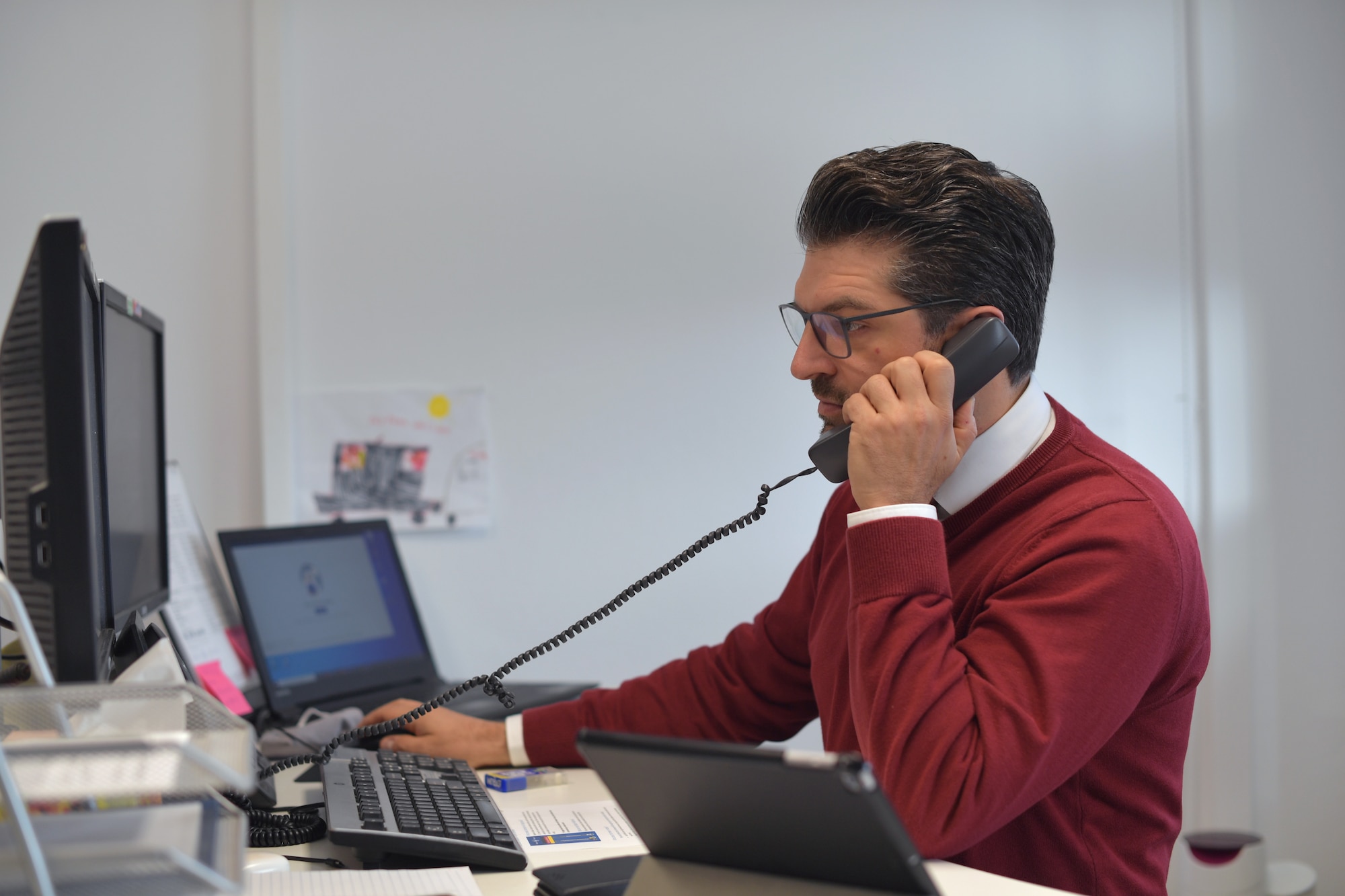 A man talking on the phone.