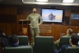 A U.S. Navy sailor introduces himself to the Brazilian Navy and Marine Corps leadership aboard the Brazilian Naval frigate Uniâo (F 45), Oct. 27.