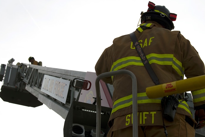 Christopher Swift, a driver operator from the 628th Civil Engineer Squadron, monitors Airmen and civilians operating during a training exercise, at Joint Base Charleston, S.C., Dec. 3, 2020. Swift and his team members at the 628th CES Fire Department support the mission by saving lives and protecting the people of Joint Base Charleston.