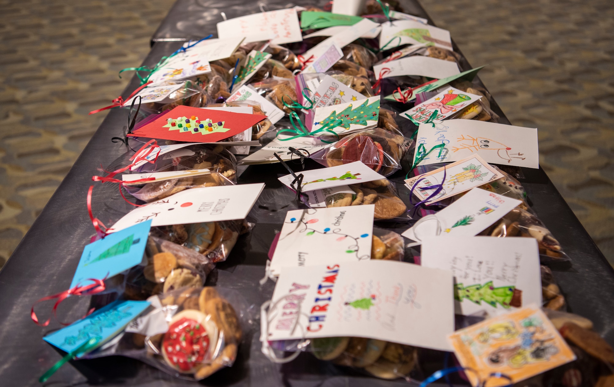 The Seymour Johnson Air Force Base Officer and Civilian Spouses Club conducted an annual Airmen Cookie Drive to benefit Airmen residing in the dorms.